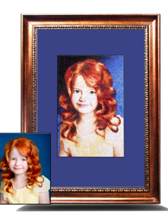 Embroidered portrait of a red-haired girl next to the original photo